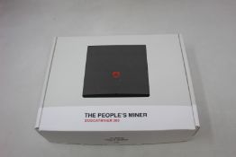 A boxed as new The People's Miner Bobcatminer 300 EU868.