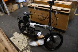 A pre-owned Furo Carbon folding electric bike (NOTE: Item has not been assembled and may be