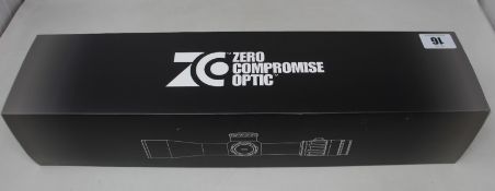 A boxed as new Zero Compromise Optic ZC527 5-27x56 illuminated FFP MPCT2 0.1 MIL rifle scope.