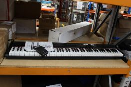 A pre-owned Fazley FSP-200 keyboard piano with pedal.