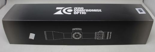 A boxed as new Zero Compromise Optic ZC527 5-27x56 illuminated FFP MPCT3 0.1 MIL rifle scope.