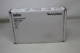 A boxed as new Braun welch allyn ThermoScan PRO 6000 with cradle.