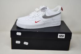 A pair of as new Nike Air Force 1 with authentication tag (UK 8).