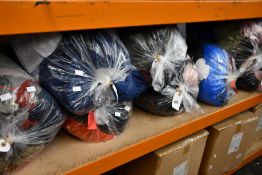 Ten bags of pre-owned clothing and related items.