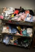 A quantity of assorted as new clothing and related items.