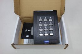 A boxed as new Multi Class SE RPK40 keypad wall switch reader.