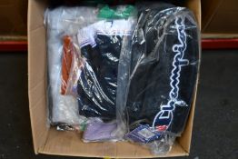 Twenty items of assorted as new Champion clothing and accessories.