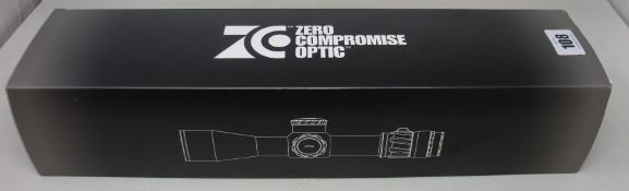 A boxed as new Zero Compromise Optic ZC527 5-27x56 illuminated FFP MPCT2 0.1 MIL rifle scope.