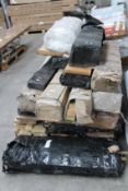 A pallet of miscellaneous timber and related items.