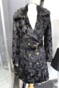 An as new Versace crushed velvet effect black coat (EU 38 - Final Approval sample - no tags).