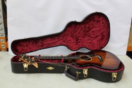 A Taylor 224ce K-DLX Electro Acoustic Guitar with some heavy damage (Important Notice: This