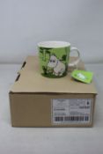 A box of six as new Arabia Moomin mugs with Moomintroll grass-green design.