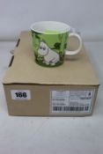 A box of six as new Arabia Moomin mugs with Moomintroll grass-green design.