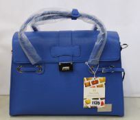 An as new Nova Harley Luxury Elegant Bluer leather changing bag.
