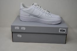 A pair of as new Nike Air Force 1 '07 (UK 7).