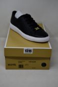 A pair of as new Michael Kors Keaton lace up sneakers (US 8.5M).