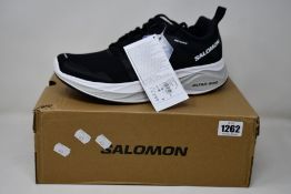 A pair of as new Salomon Glide Max (UK 11).