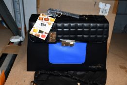 An as new Nova Harley Luxury Athens leather changing bag.