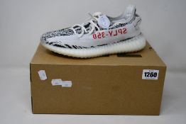 A pair of as new Adidas Yeezy Boost 350 with authentication tag (UK 7).