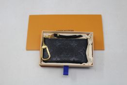 An as new Louis Vuitton key pouch.