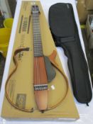 A Yamaha Silent Guitar Natural (SLG200N).