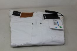A pair of DSquared2 Super Twinky jeans in white (TG 52).