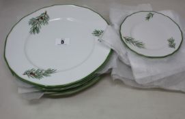 A quantity of Augarten Wien hand painted fir branch part dinner service to include eight dinner