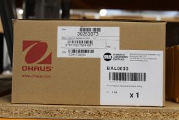 A boxed as new OHAUS SX622 scout portable precision scales.