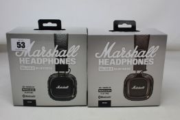 Two pre-owned Marshall Major 2 Bluetooth headphones.