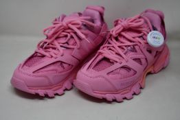 A pair of pre-owned pink Balenciaga sneakers with authentication tag (UK 6 - Very good condition).