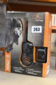A boxed as new SportDOG SportTrainer 700M remote trainer.
