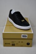 A pair of as new Michael Kors Keaton lace up sneakers (US 9M).