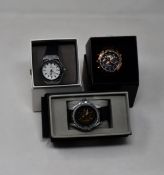 Three men's as new Vault automatic watches.