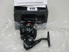 A boxed as new Daiwa Tatula LT 3000D-CXH Spinning Reel.