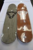 Two as new Palace K9 skateboard decks.