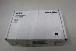 A boxed as new Braun welch allyn ThermoScan PRO 6000 with cradle.