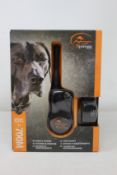 A boxed as new SportDOG SportTrainer 700M remote trainer.