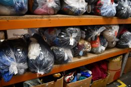 Ten bags of pre-owned clothing and related items.