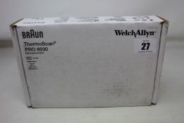 A boxed as new Braun welch allyn ThermoScan PRO 6000 with cradle.