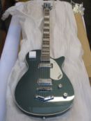 A boxed as new Gretsch G5260 Electromatic Jet Baritone Electric Guitar in Jade Grey Metallic.