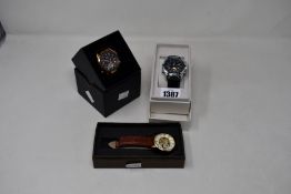Three men's as new Vault automatic watches.