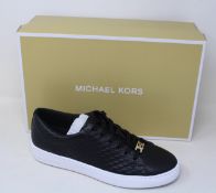 A pair of as new Michael Kors Keaton lace up sneakers (US 10M).