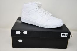 A pair of as new Nike Air Jordan 1 Mid (UK 11).