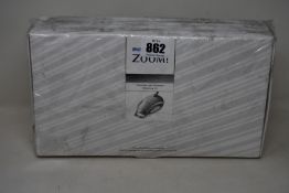 A boxed Phillips Zoom chairside light activated whitening kit.