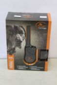 A boxed as new SportDOG SportTrainer 700M remote trainer.