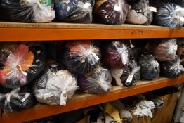 Eleven bags of pre-owned clothing and related items.