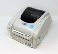 An as new TSC TDP-247 Direct Thermal Desktop Label Printer (PSU included. No Box).