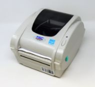 An as new TSC TDP-247 Direct Thermal Desktop Label Printer (PSU included. No Box).