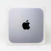 A pre-owned Apple Mac Mini (2020) with M1 Chip, 16GB RAM and 256GB SSD (M/N: A2348 P/N: Z12N0000J S/