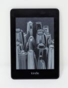 A pre-owned Amazon Kindle 10th Gen in Black.